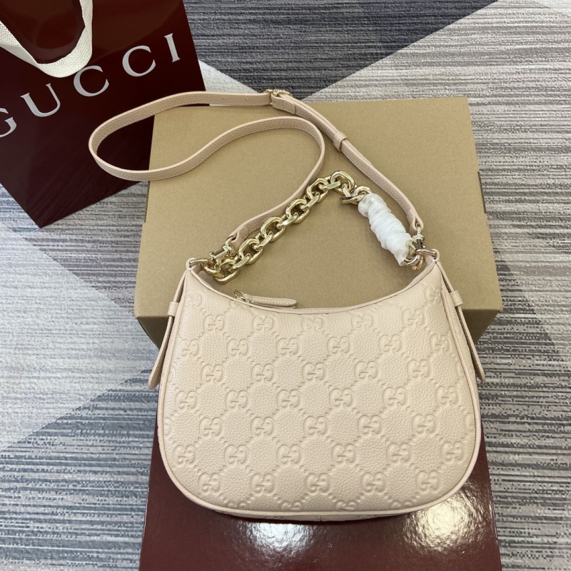 G*u*i top handle bags